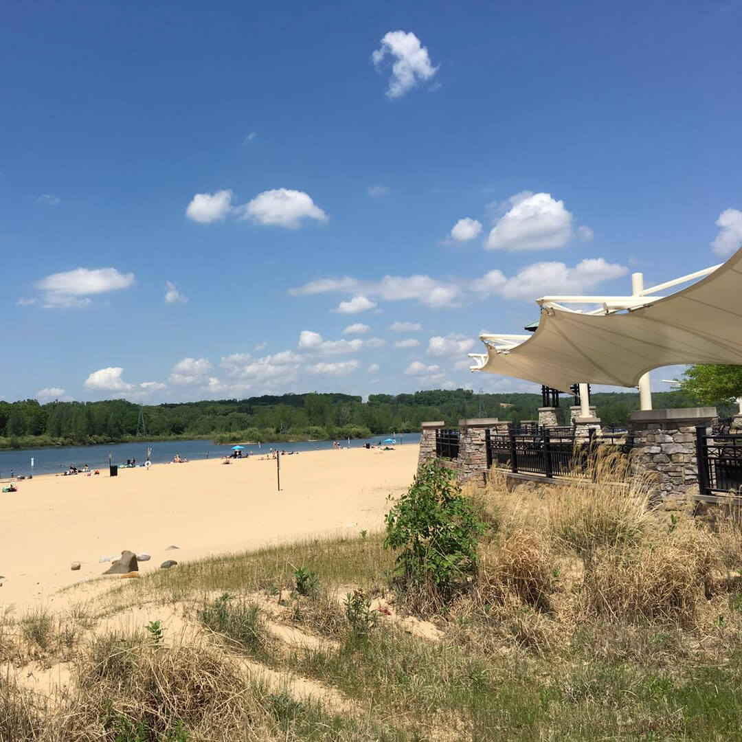 9 Michigan Swimming Holes to Swing Into for a Rustic Summer