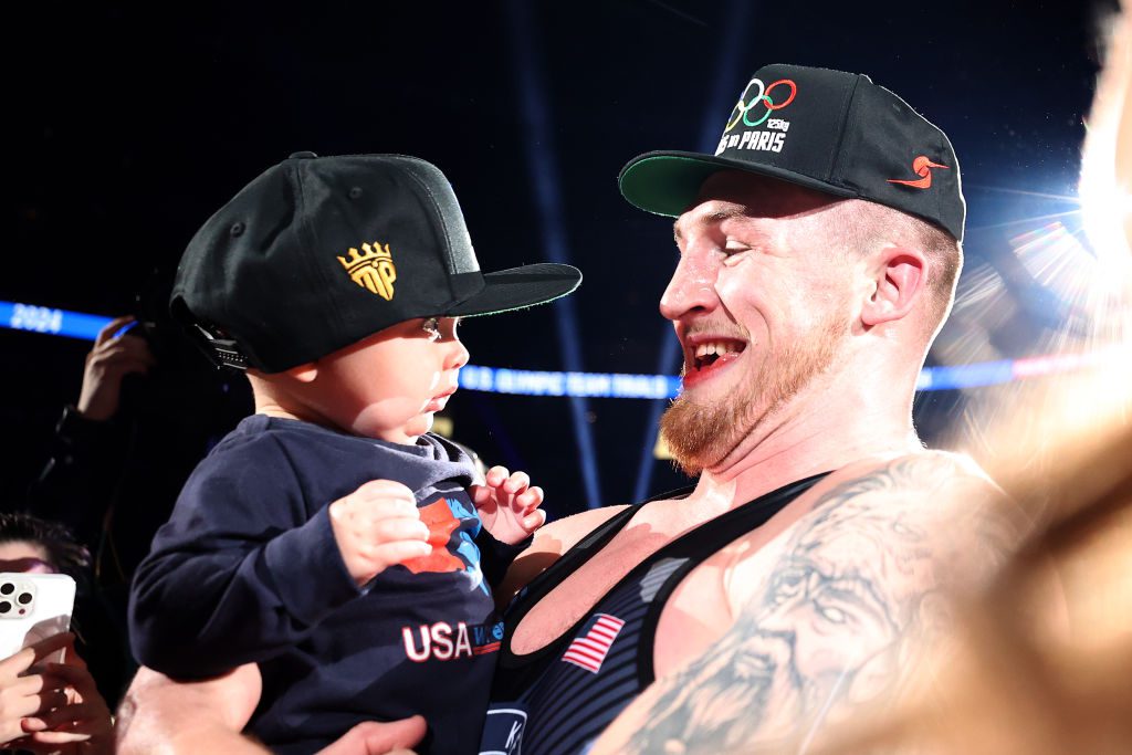 STATE COLLEGE, PENNSYLVANIA - APRIL 20: Mason Parris reacts with family after defeating Hayden Zillmer to win the men's freestyle 125-KG division during the US Olympic Wrestling Trials held at the Bryce Jordan Center on April 20, 2024 in State College, Pennsylvania. (Photo by Tim Nwachukwu/Getty Images)