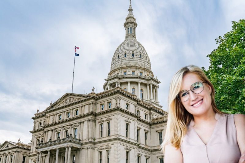 Photo of Abby Klomparens, from Greater Holland, candidate for Michigan House District 86, in front of photo of Michigan Capitol building