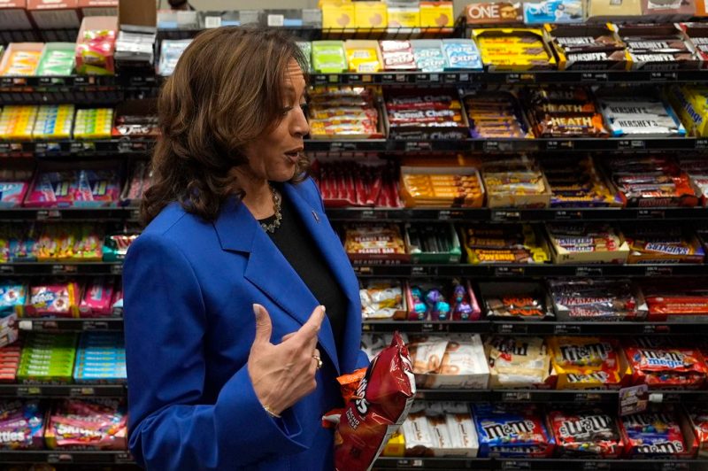 Democratic presidential nominee Vice President Kamala Harris holds a bag of Doritos chips at Sheetz convenience store during a campaign stop, Sunday, Aug. 18, 2024, in Coralpolis, Pa. (AP Photo/Julia Nikhinson)