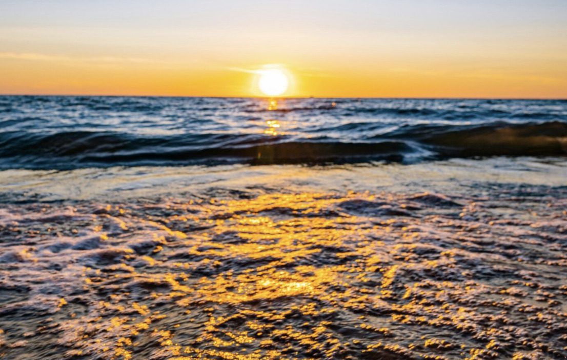 A beautiful sunset at Oval Beach in Saugatuck