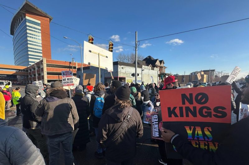 Protesters outside the Motor City Casino in Detroit, on Tuesday, Jan. 13, 2026, following Trump's speech to the Detroit Economic Club. (AP Photo/Corey Williams)